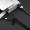 Dobbeltkobling Glidelås-ladekabel – USB-C & Lightning
